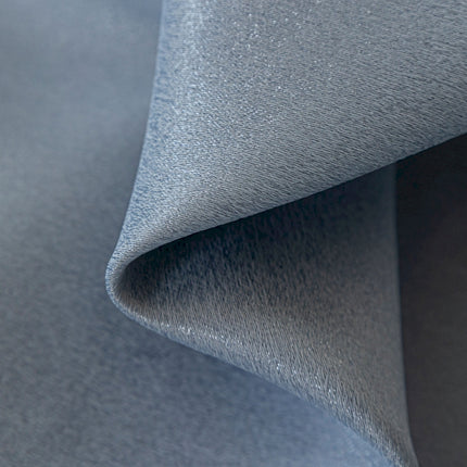 a close up view of a blue fabric