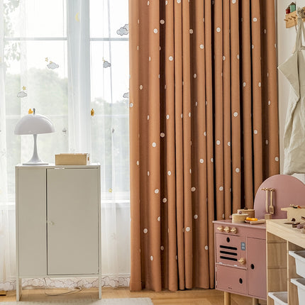 a child's room with a white cabinet and pink dresser