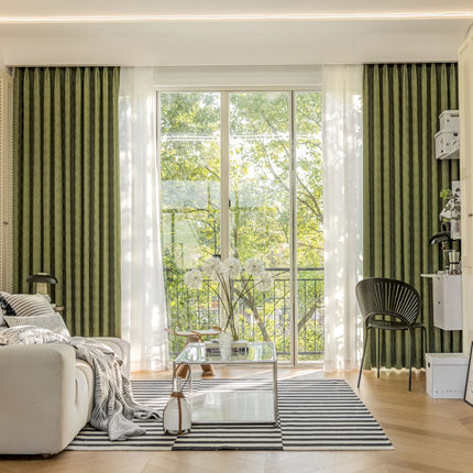 a living room filled with furniture and a large window