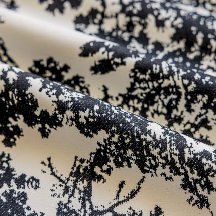 a close up of a black and white fabric