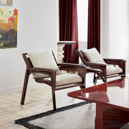 a living room with two chairs and a coffee table