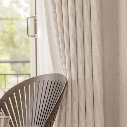 a wooden chair sitting next to a window