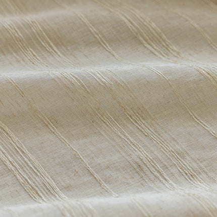 a close up view of a beige fabric
