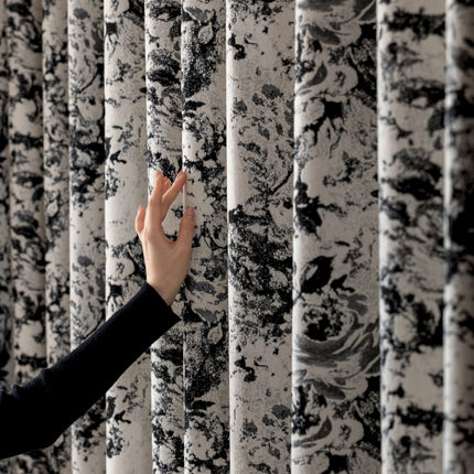 a woman is touching a wall with her hand