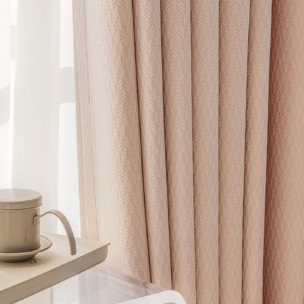 a coffee cup sitting on a counter next to a window